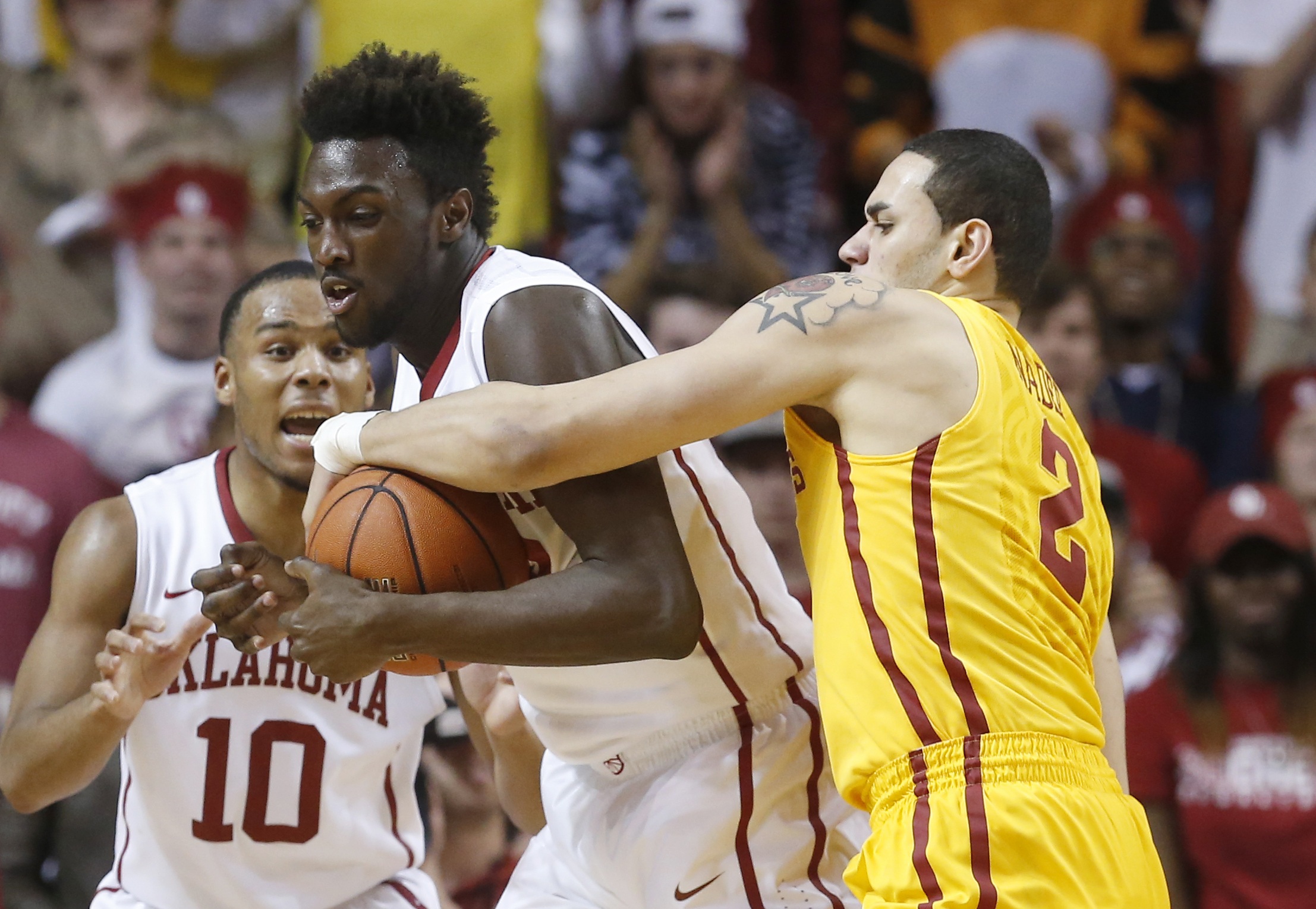 Sue Ogrocki/Associated Press/Associated Press/Associated Press/Associated Press/Associated Press Khadeem Lattin (middle) endures trash talk because he was home-schooled.
